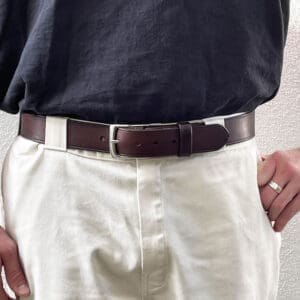 Man white pants full-grain dark brown leather belt