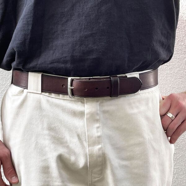 Man white pants full-grain dark brown leather belt